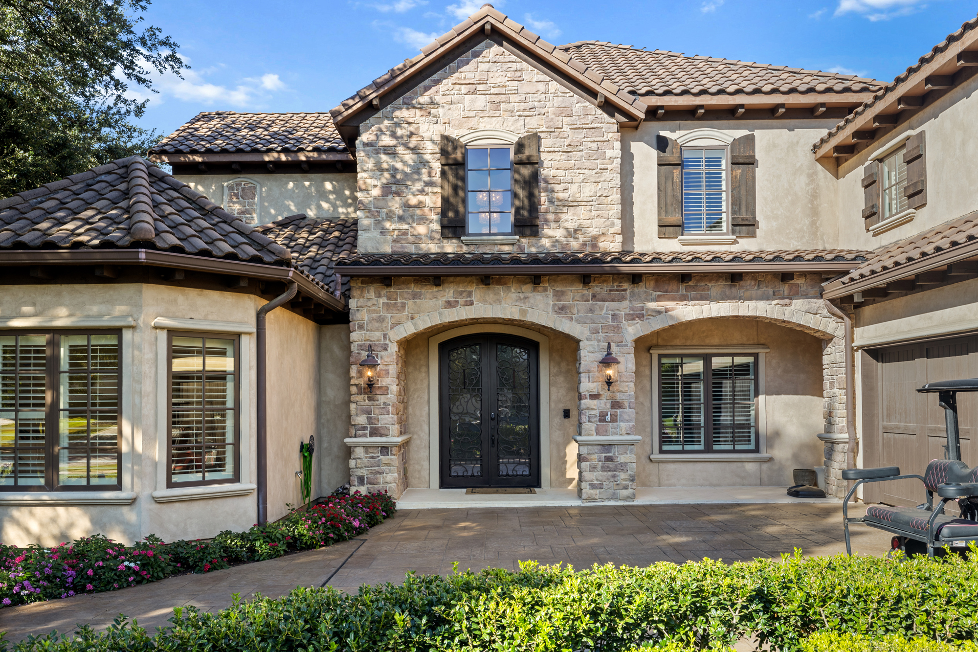 Mediterranean stone entry of a luxury home listed by Kim Assaad in Southlake