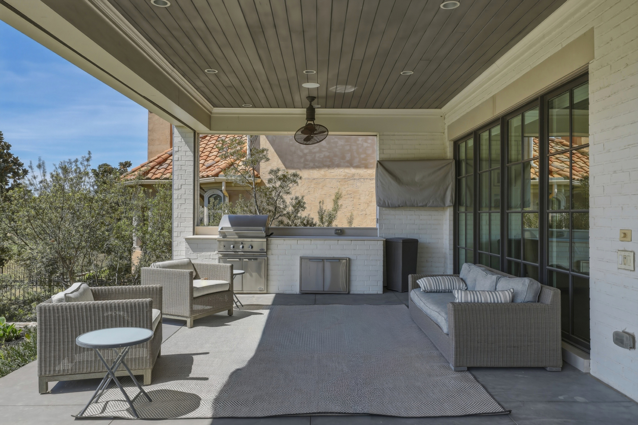 Covered patio with outdoor dining in a Southlake luxury home